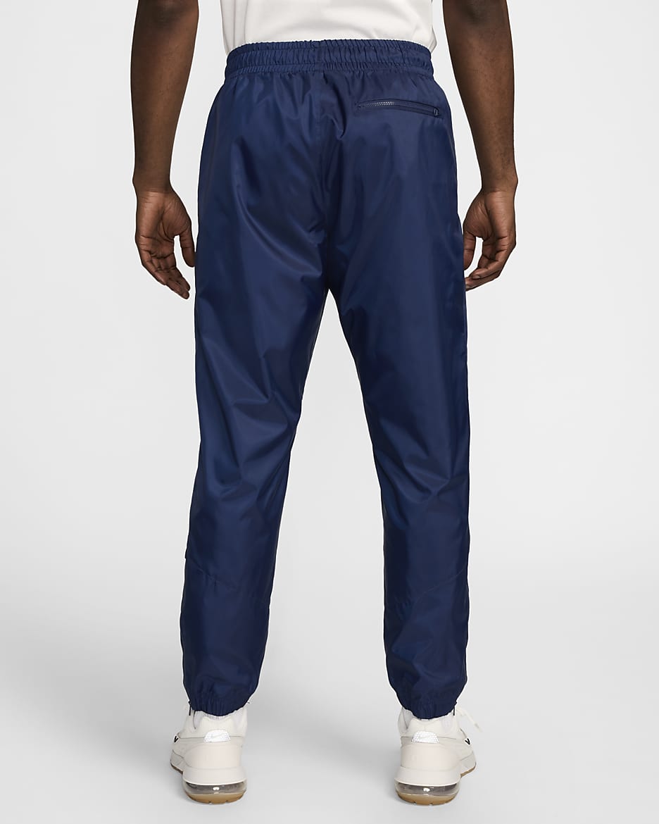 Nike windrunner pants blue best sale